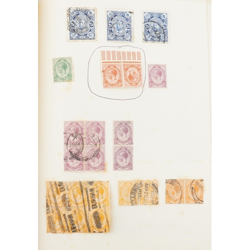 1540 - A black album containing early 20th century and later South African stamps to include blocks of twel... 