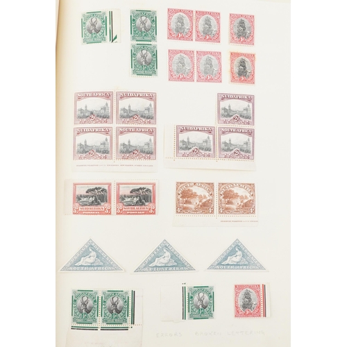 1540 - A black album containing early 20th century and later South African stamps to include blocks of twel... 