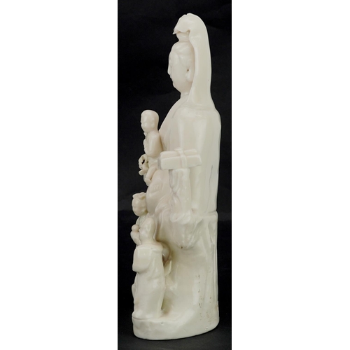 179 - A Chinese blanc de chine figure of Guanyin, late 19th/early 20th century, 24cm high.