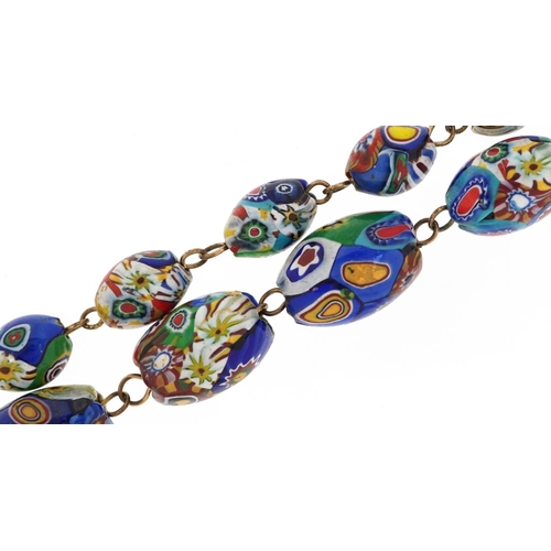 2492 - A Venetian hand painted glass bead necklace, 62cm in length.