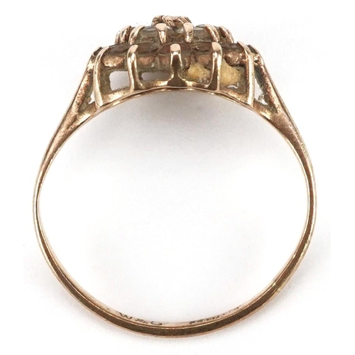 2335 - A 9ct gold clear stone three tier cluster ring, size K, 1.9g.