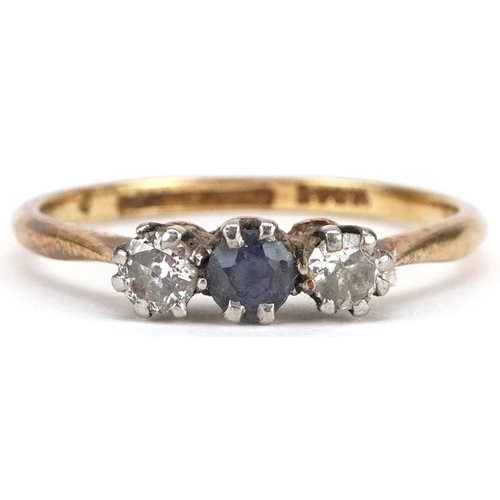 2153 - An 18ct gold and platinum diamond and sapphire three stone ring, size O, 2.1g.