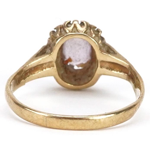 2157 - A 9ct gold amethyst and diamond cluster ring, size J, 1.8g.