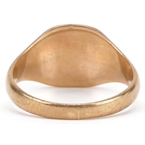 2057 - A 9ct gold signet ring, size T/U, 5.3g.