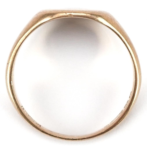 2057 - A 9ct gold signet ring, size T/U, 5.3g.