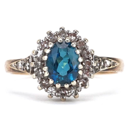 2062 - A 9ct gold diamond and blue stone cluster ring, size M, 2.5g.