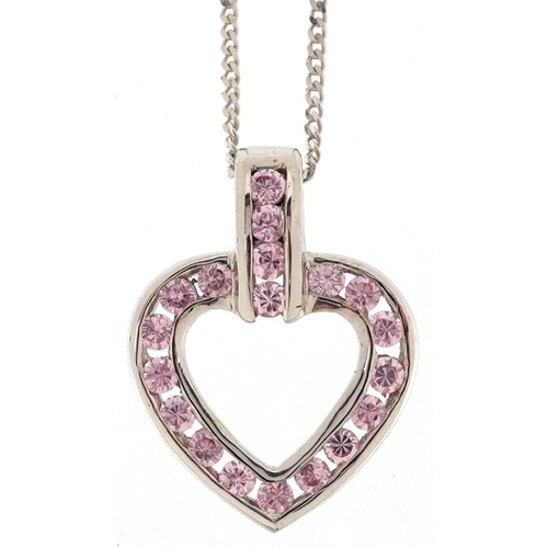 2055 - A 9ct white gold pink stone love heart pendant on a brokent 9ct gold necklace, the pendant 1.5cm hig... 