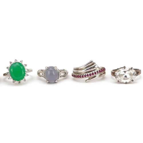 2518 - Seven silver rings set with semi precious stones including emerald, ruby and amethyst, various sizes... 