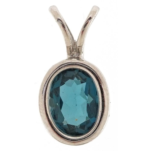 2494 - A 9ct white gold blue topaz solitaire pendant, 1.7cm high, 1.7g.