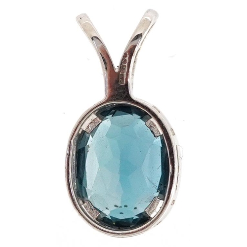 2494 - A 9ct white gold blue topaz solitaire pendant, 1.7cm high, 1.7g.