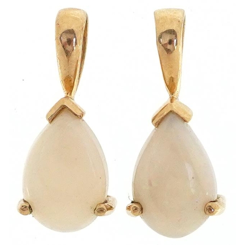 2531 - A pair of unmarked gold opal teardrop pendants, 1.6cm high, total 1.6g.