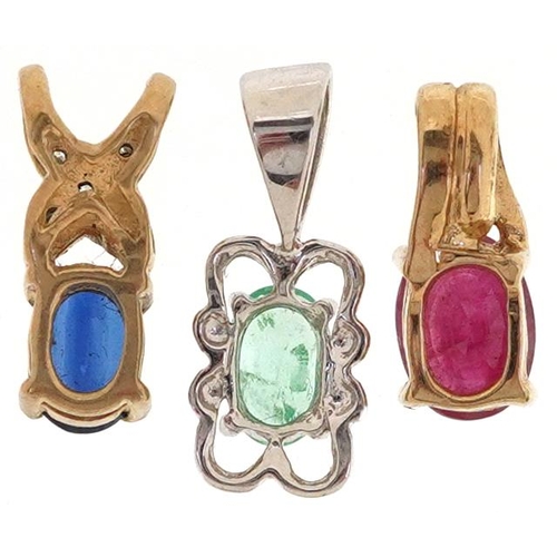 2520 - Three unmarked gold semi precious stone solitaire pendants set with ruby, emerald, blue spinel and d... 