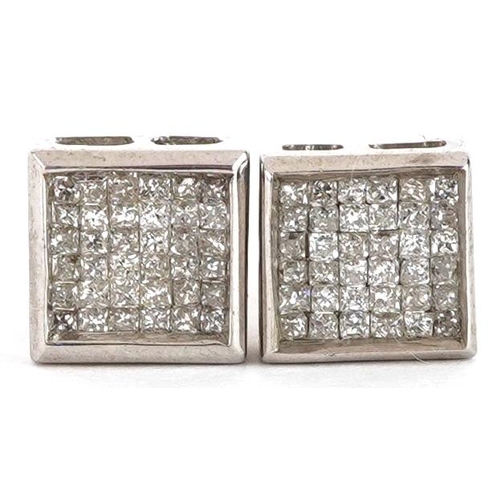 2007 - A pair of 9ct white gold diamond cluster stud earrings, 7.5mm x 7.5mm, total 1.9g.