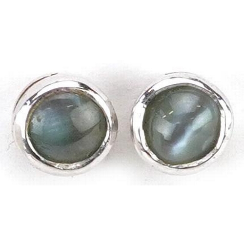 2361 - A pair of 9ct white gold blue stone stud earrings, 5.8mm in diameter, total 0.9g.