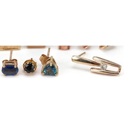 2533 - A collection of mostly 9ct gold earrings and pendants set with semi precious stones including sapphi... 