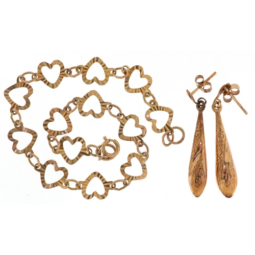 2358 - A 9ct gold love heart design bracelet and a pair of 9ct gold drop earrings, total weight 2.6g.