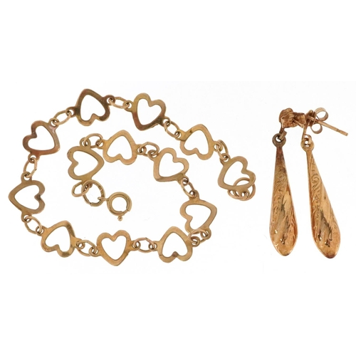 2358 - A 9ct gold love heart design bracelet and a pair of 9ct gold drop earrings, total weight 2.6g.