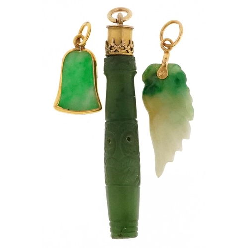 2529 - Three carved green stone jade style pendants including one with a Maori face all with yellow metal m... 