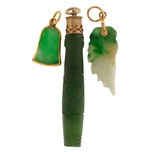 2529 - Three carved green stone jade style pendants including one with a Maori face all with yellow metal m... 