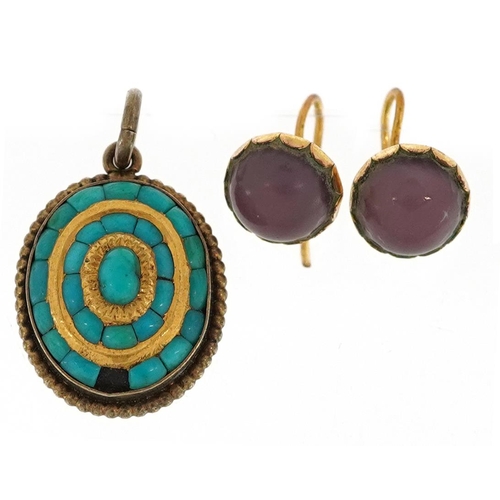 2508 - An antique yellow metal turquoise pendant and a pair of cabochon purple stone earrings, the pendant ... 