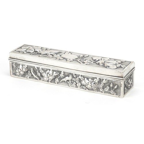 58 - A Chinese export rectangular silver box with hinged lid, embossed with birds amongst flowers, SM mak... 