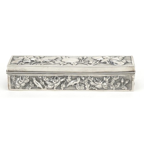 58 - A Chinese export rectangular silver box with hinged lid, embossed with birds amongst flowers, SM mak... 