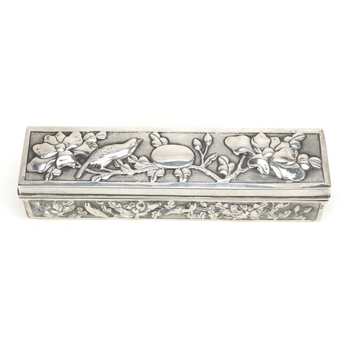 58 - A Chinese export rectangular silver box with hinged lid, embossed with birds amongst flowers, SM mak... 