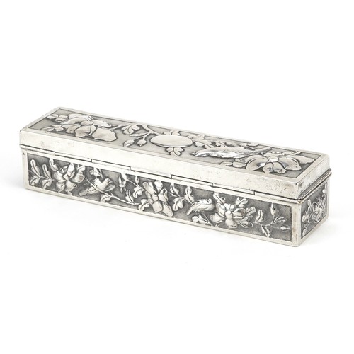 58 - A Chinese export rectangular silver box with hinged lid, embossed with birds amongst flowers, SM mak... 