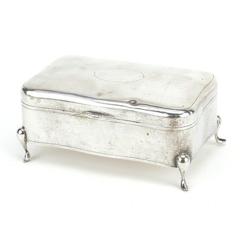 57 - Luen Wo, a Chinese export silver serpentine jewellery box raised on four feet, 7.5cm H x 16cm W x 10... 