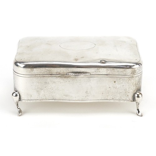 57 - Luen Wo, a Chinese export silver serpentine jewellery box raised on four feet, 7.5cm H x 16cm W x 10... 