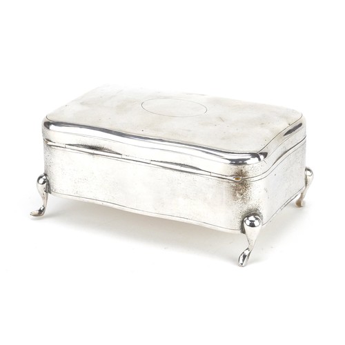 57 - Luen Wo, a Chinese export silver serpentine jewellery box raised on four feet, 7.5cm H x 16cm W x 10... 