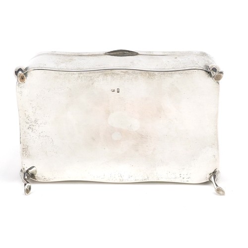 57 - Luen Wo, a Chinese export silver serpentine jewellery box raised on four feet, 7.5cm H x 16cm W x 10... 