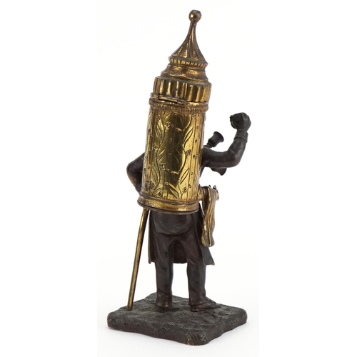 291 - 19th century partially gilt patinated bronze table vesta in the form of a pedlar, 19cm high