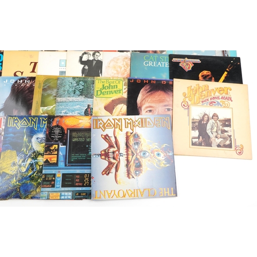 1049 - A collection of predominantly 1970s and 80s pop and rock vinyl LP records including Iron Maiden, Don... 