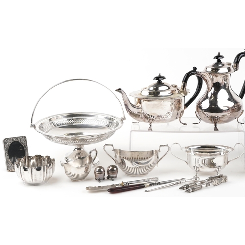 1315 - A small collection of silver and plated items including three piece tea set, a tazza, a pair of salt... 