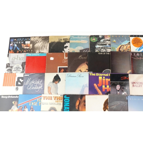 1046 - A collection of predominantly 80s and 90s vinyl LP records including Lou Reid, U2, Ian Hunter, Simpl... 