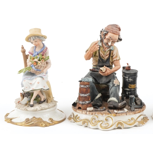 451 - A 20th century Capodimonte porcelain figure group of The Cobbler, signed, 22cm high, together with t... 