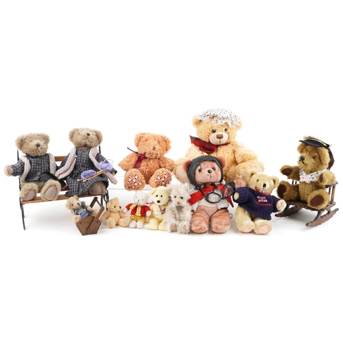 1355 - A small collection of mixed stuffed teddy bears including Rupert Bear and an example of two on a ben... 