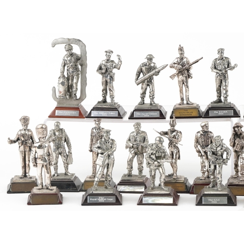 2302 - A collection of Royal Hampshire metal military figures, on plinth bases.