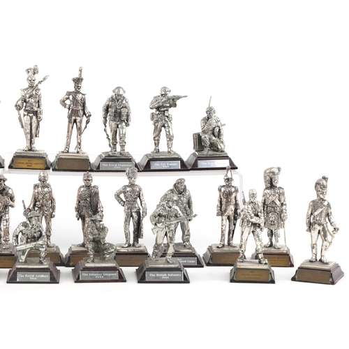 2302 - A collection of Royal Hampshire metal military figures, on plinth bases.