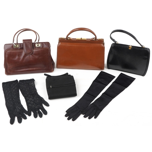 1023 - A group of four vintage and later leather ladies handbags and tow pairs of gloves.