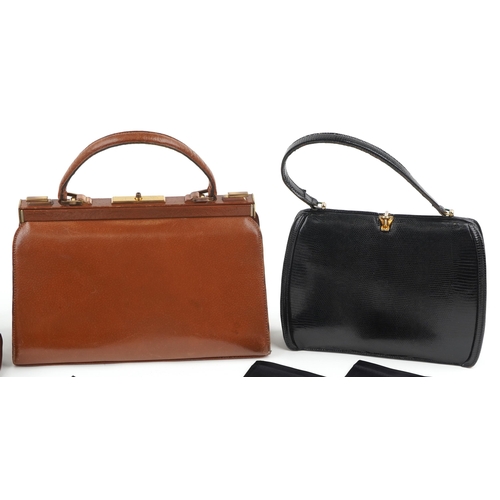 1023 - A group of four vintage and later leather ladies handbags and tow pairs of gloves.