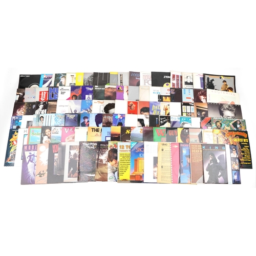 1054 - A collection of vinyl LP records including The Thompson Twins, Madonna, Huey Lewis and the News, Pau... 