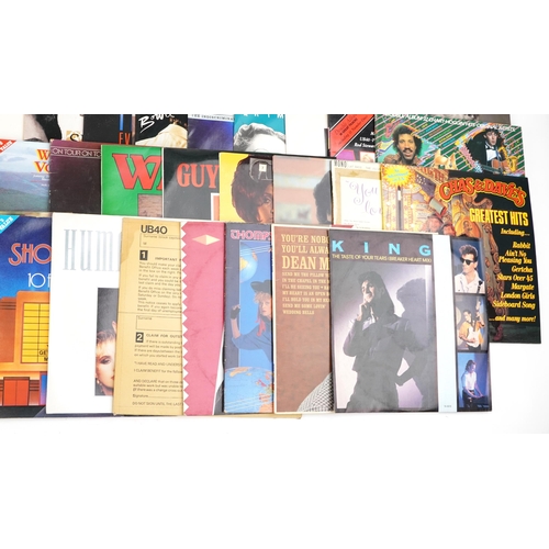 1054 - A collection of vinyl LP records including The Thompson Twins, Madonna, Huey Lewis and the News, Pau... 