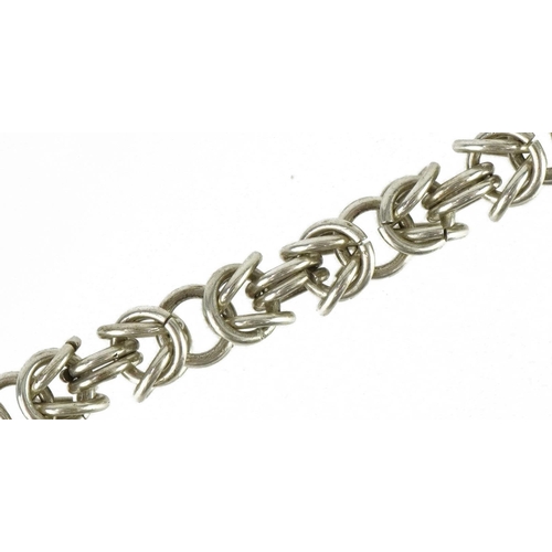 3672 - Modernist white metal multi link bracelet with T bar, 20cm in length, 21.6g