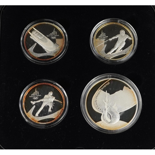 2299 - Torino 2006 Olympic Winter Games, set of four silver coins housed in a fitted case.