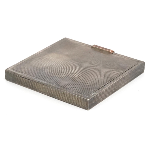 30 - David Sutton & Sons, an Art Deco style engine turned silver compact, London 1948, 7.5cm wide, 152.0g... 