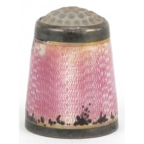  A continental 935 grade silver and pink guilloche enamel thimble hand painted with a courting couple... 