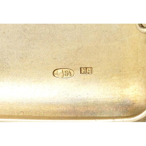  A Russian silver cigarette case with cabochon garnet push button and gilt interior, with inscription... 