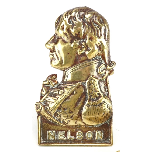 167 - A 19th century brass desk stand of Nelson in profile, 12cm high, together with a set of Salter brass... 